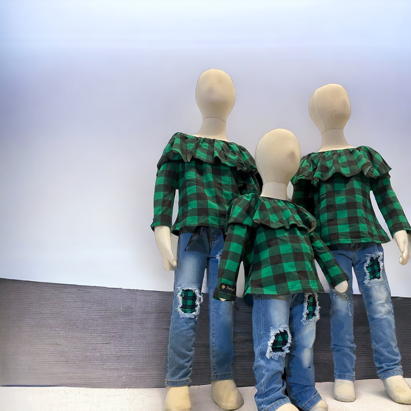 2 piece green and black plaid ruffle long sleeve top with matching jeans